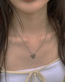 Kahi Ribbon Ball Necklace
