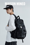 EYELET THREE-POCKET BUCKLE BACKPACK