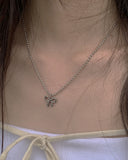 Kahi Ribbon Ball Necklace