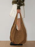 SUEDE EYELET SHOULDER BAG