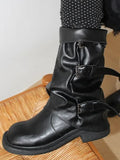 SLOUCH BUCKLE BOOTS