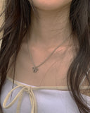 Kahi Ribbon Ball Necklace