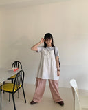 Hohoi button pintuck sleeveless blouse