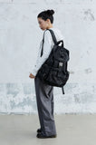 EYELET THREE-POCKET BUCKLE BACKPACK