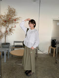 Tomou banding patch cargo cotton long skirt