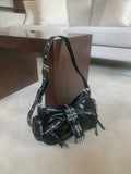 Gate eyelet buckle shoulder bag