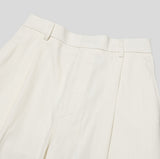 Again one tuck denim pants