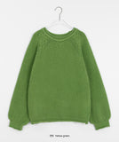 Habibi round neck cable over knit