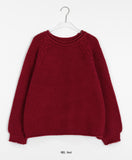 Habibi round neck cable over knit