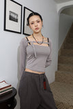 Two-way buckle eyelet tee