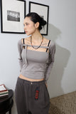 Two-way buckle eyelet tee
