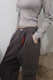 Two-way buckle eyelet tee