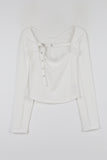 Two-way buckle eyelet tee
