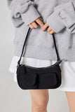 Teeny pocket shoulder bag