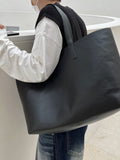 Big square leather bag
