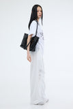 Curd Eyelet Shoulder Bag