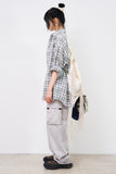 Phaidon over check shirt