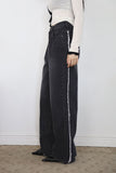 Tone-on tassel black denim