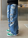 Destroyed washing latex denim