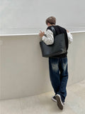 Big square leather bag