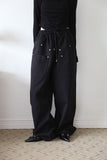 Trimming rivet over pants