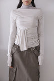 Modal shirring muffler top