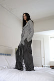 String ribbon over pants
