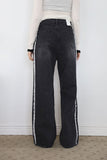 Tone-on tassel black denim