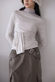 Modal shirring muffler top