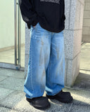 Dirty denim balloon jeans