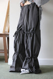 String ribbon over pants