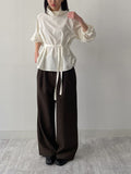 High-neck belted balloon-fit blouse