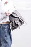 Diora Leather Two Pocket Backpack