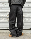 Spider denim pants