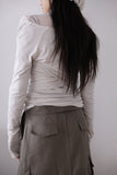 Modal shirring muffler top