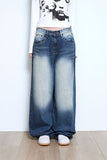 tin brush over denim