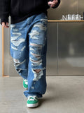 Destroyed washing latex denim