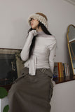 Modal shirring muffler top