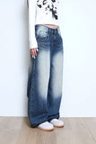 tin brush over denim