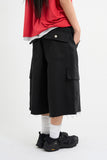 Rough-cut Bermuda shorts