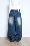 tin brush over denim