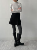 Wool pin tuck A-line mini skirt
