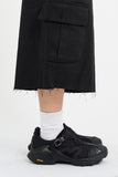 Rough-cut Bermuda shorts
