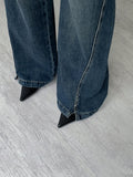 Slit semi-bootcut denim pants