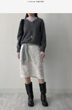 Raccoon V-neck loose-fit knit