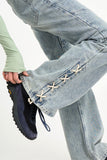 Sage cross lace denim pants