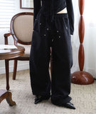 Trimming rivet over pants