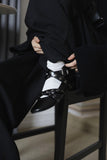 Punching stud strap shoes