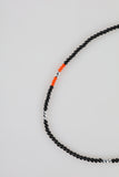 Orange bead necklace