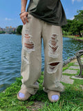 Neutral Beige Destroyed Denim Jeans